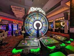 phwin88 mobile interface showing slots and live casino sections on a smartphone screen